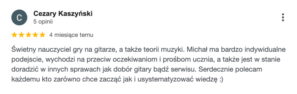 nauczyciel gry na gitarze